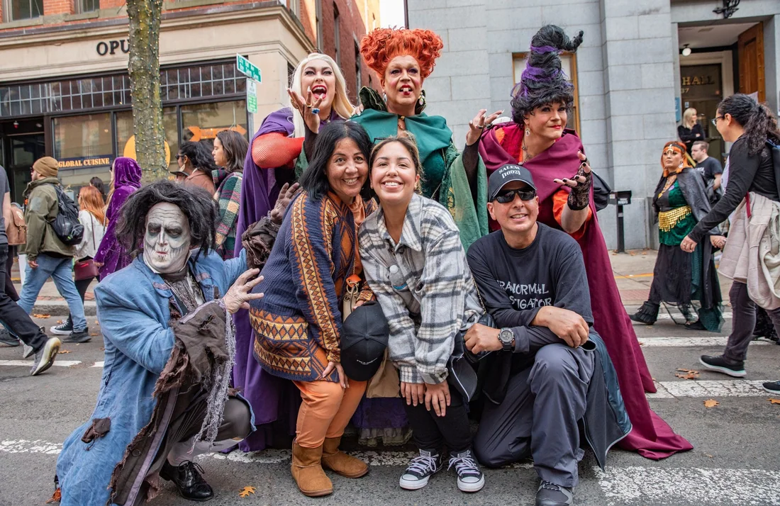 Costumed Halloween visitors in Salem, photographed by Creative Collective MA and featured by the official Haunted Happenings organizer.